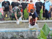 Walikota Jaya Negara Tebar Benih Ikan di Tukad Beling dan Tukad Wang Bige